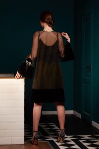 Shift tulle dress adorned with velvet band and floral appliqués made of solsstiss lace and fringes