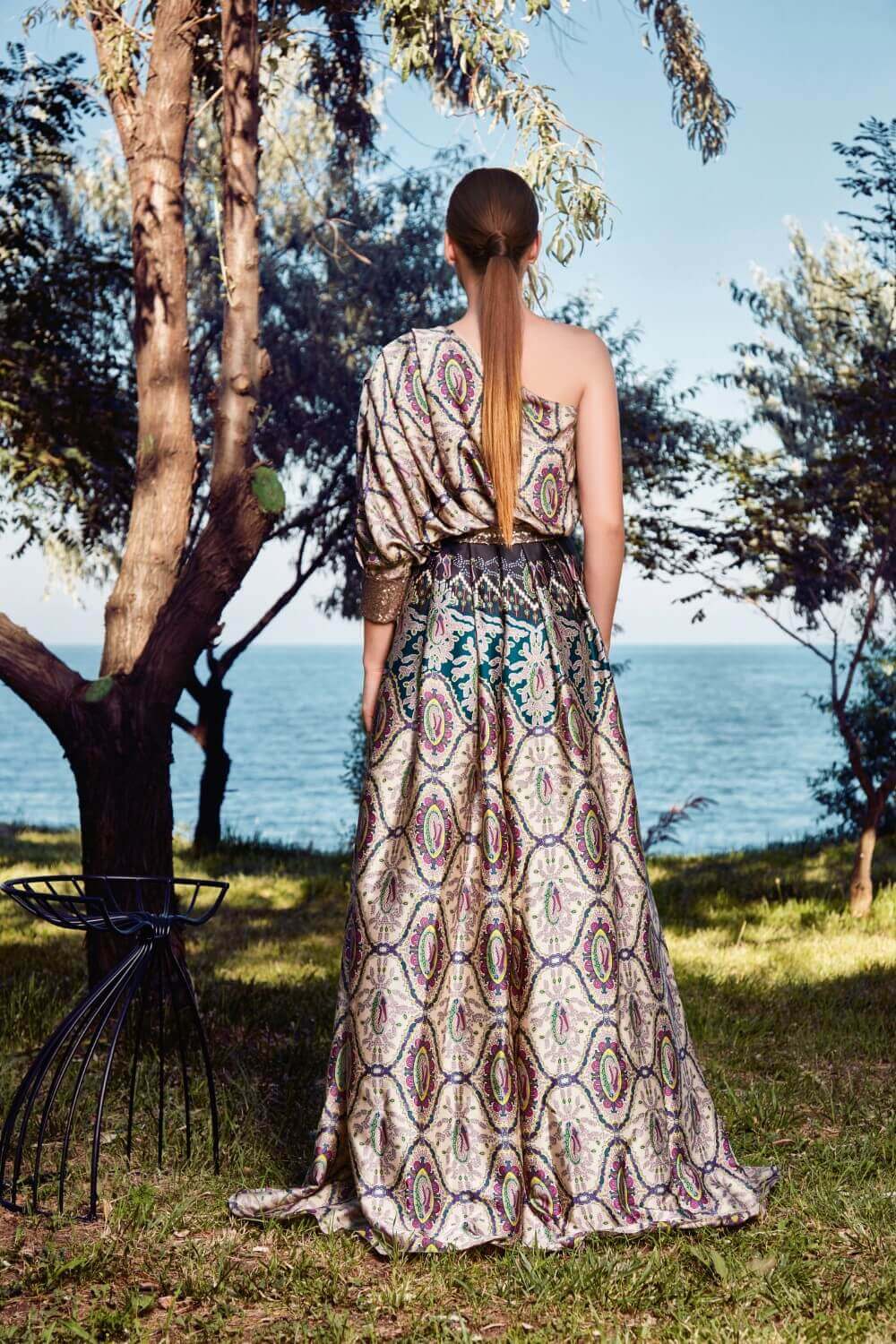 One-shoulder Maxi dress made of silk featuring a volumetric sleeve and a sequins narrow belt