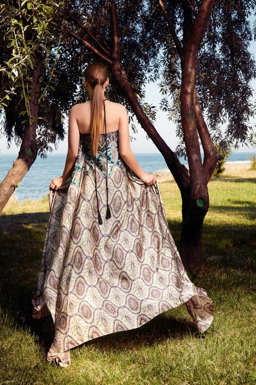 Halterneck butterfly gown made of silk featuring an exquisite print