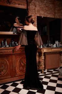 Off the shoulder mermaid dress made of velvet featuring bell sleeves
