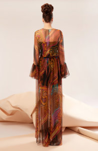 Gown made of natural silk featuring sleeves and ruffles