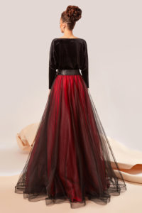 Gown featuring a blend of velvet and tulle and a sateen cord adorned with handmade flowers applique